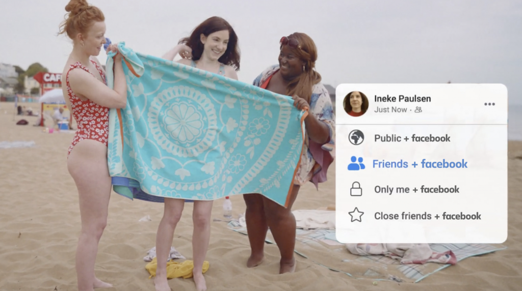Facebook advert showing a person undressing behind towels held up by her friends on the beach